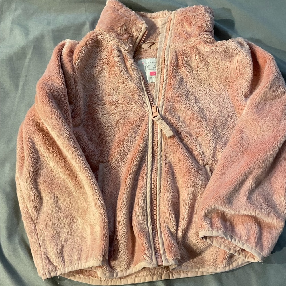 Girl’s pink fleece.